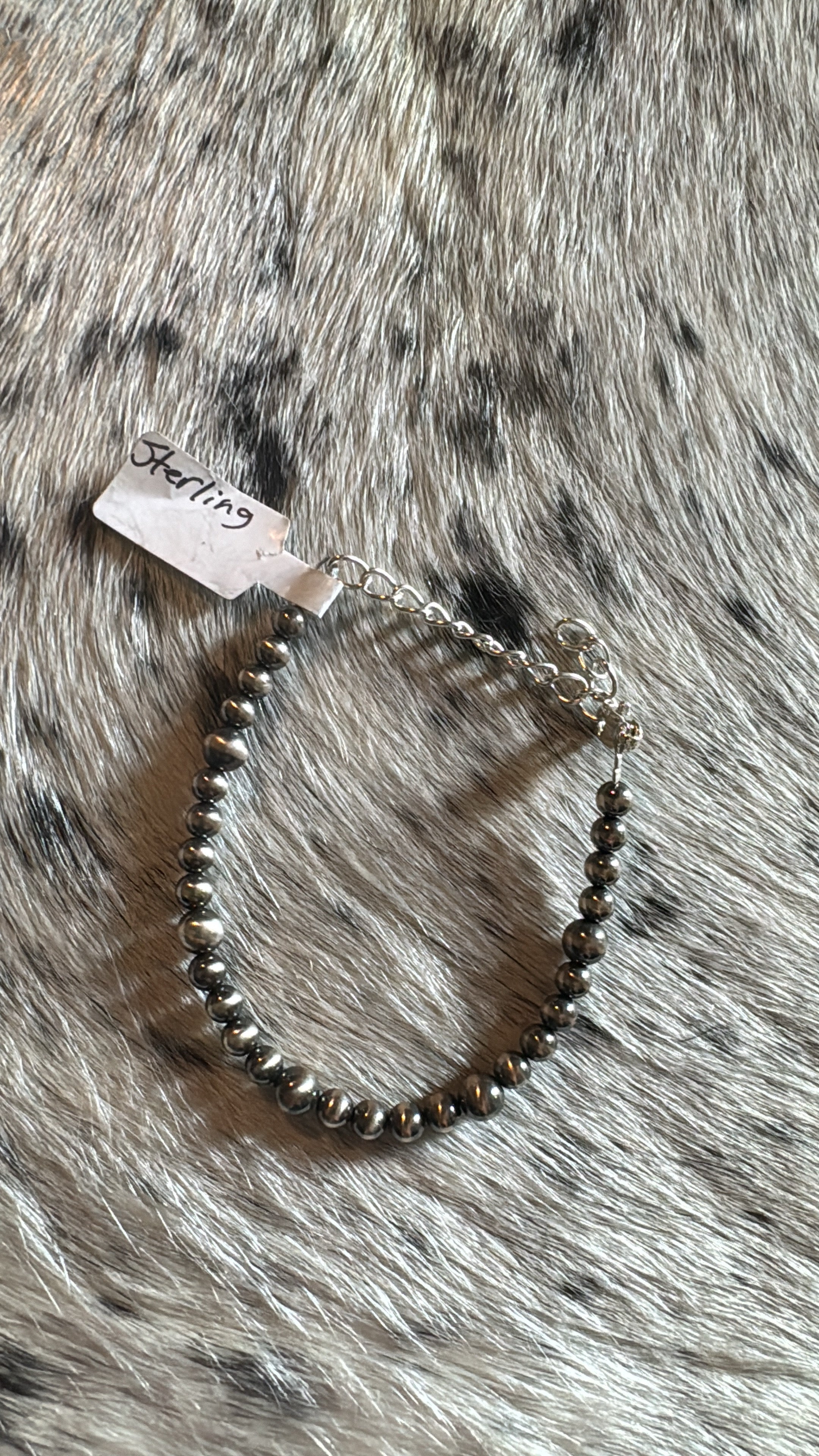 Four and 5MM sterling silver bracelet