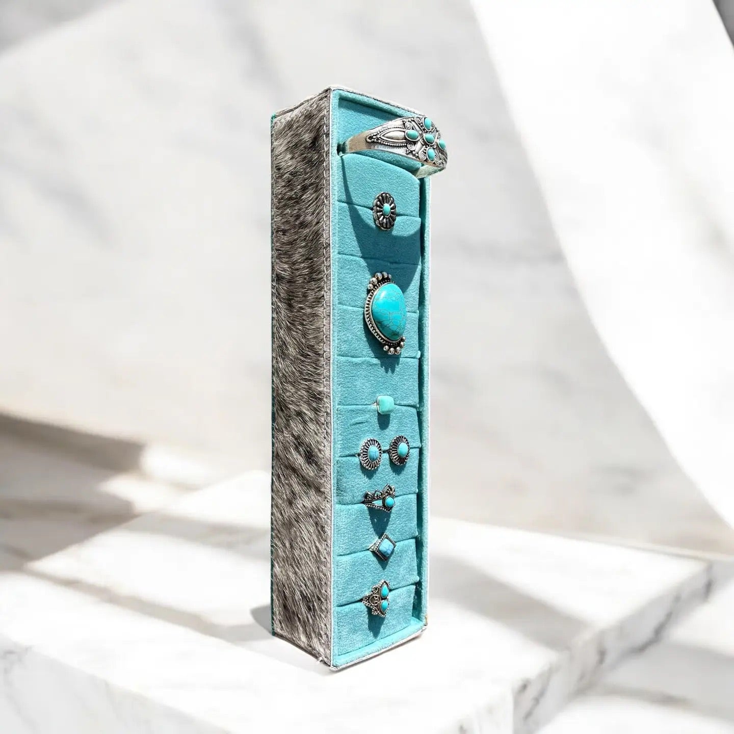 Turquoise all cowhide ring display
