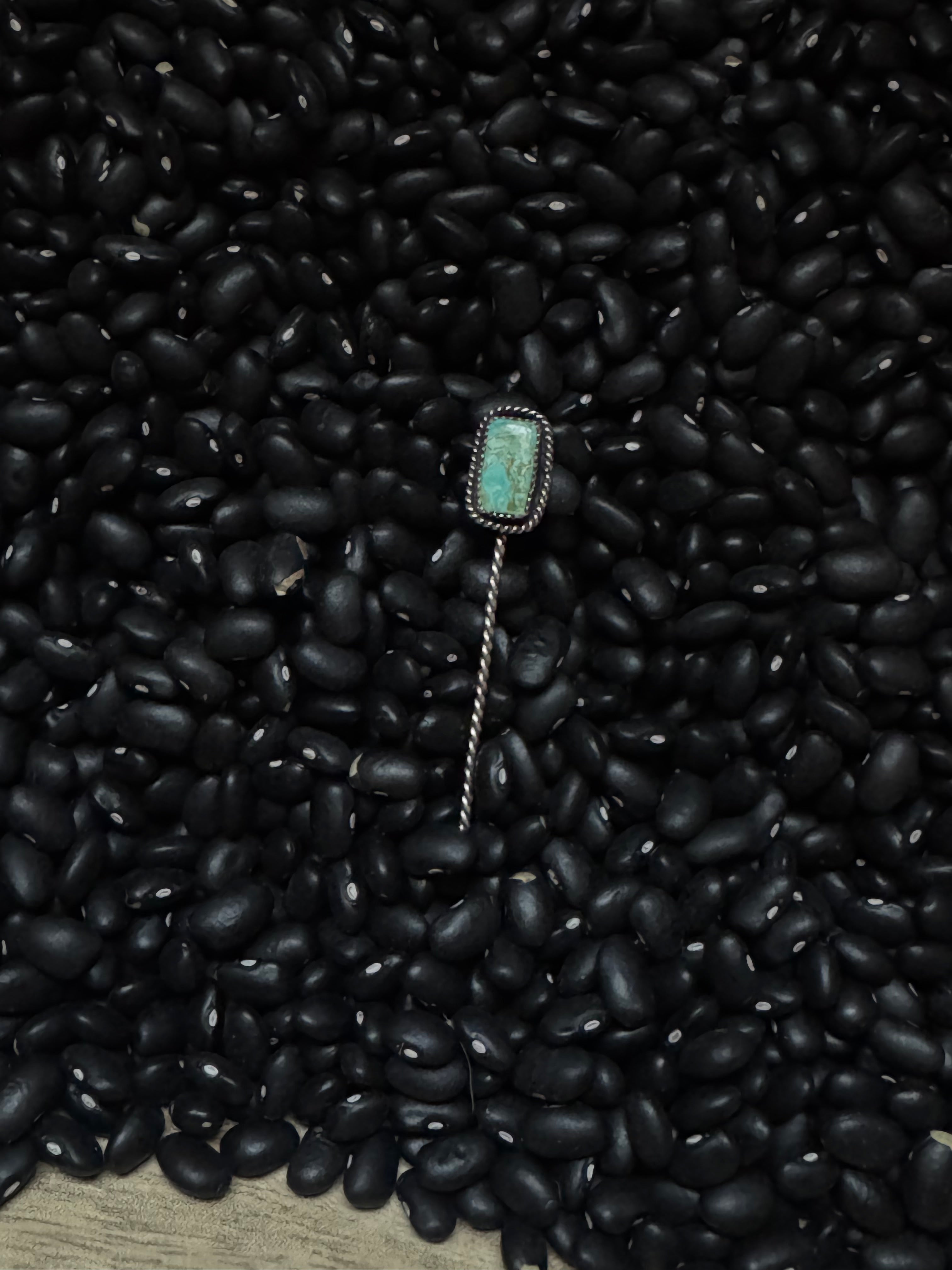Royston turquoise hat, pen