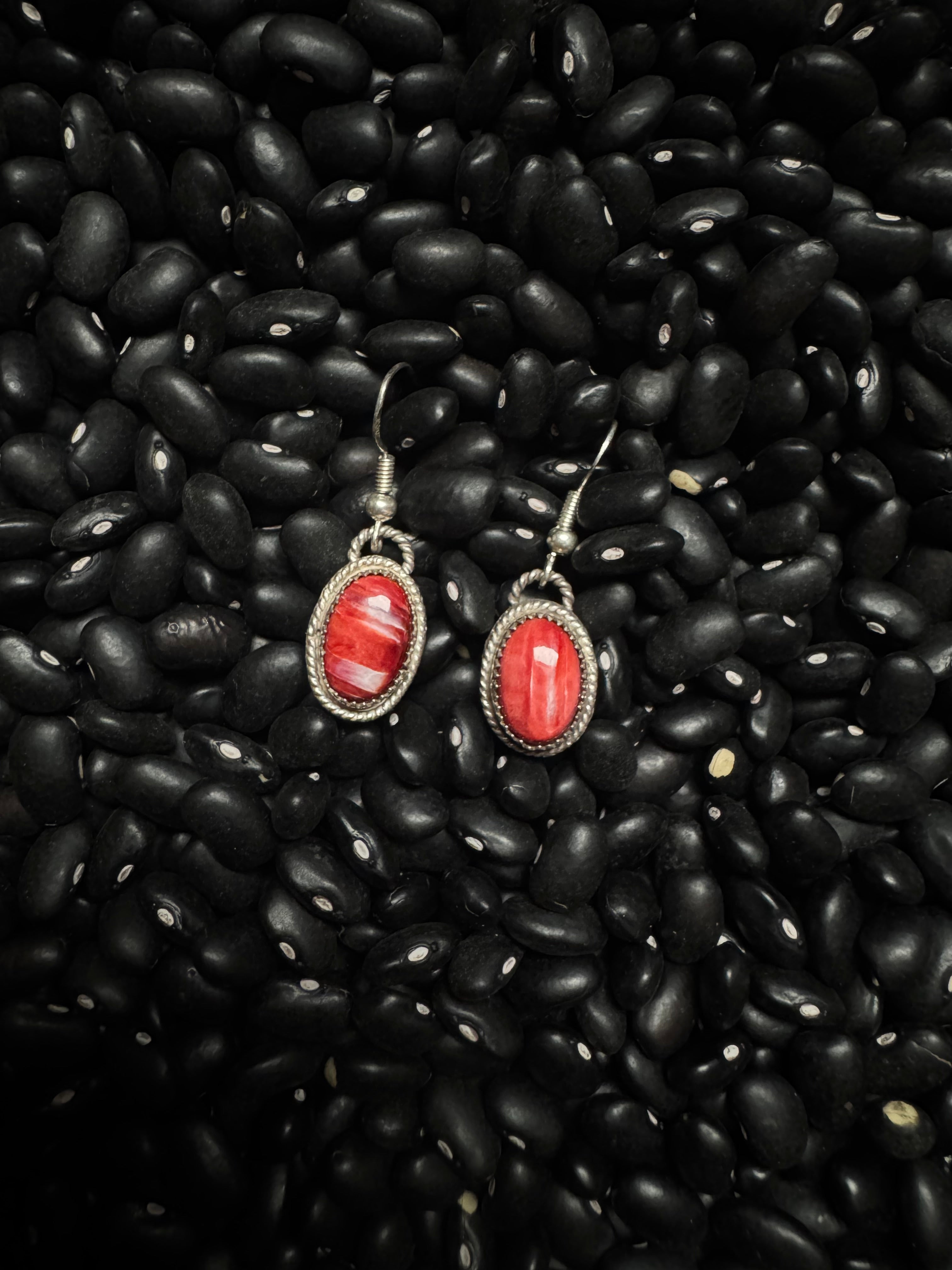 Red spine stud earrings