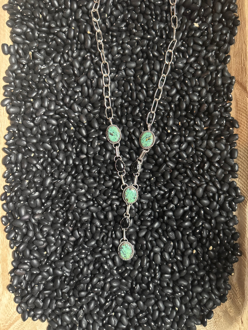 Mountain, turquoise and black Onyx lariat
