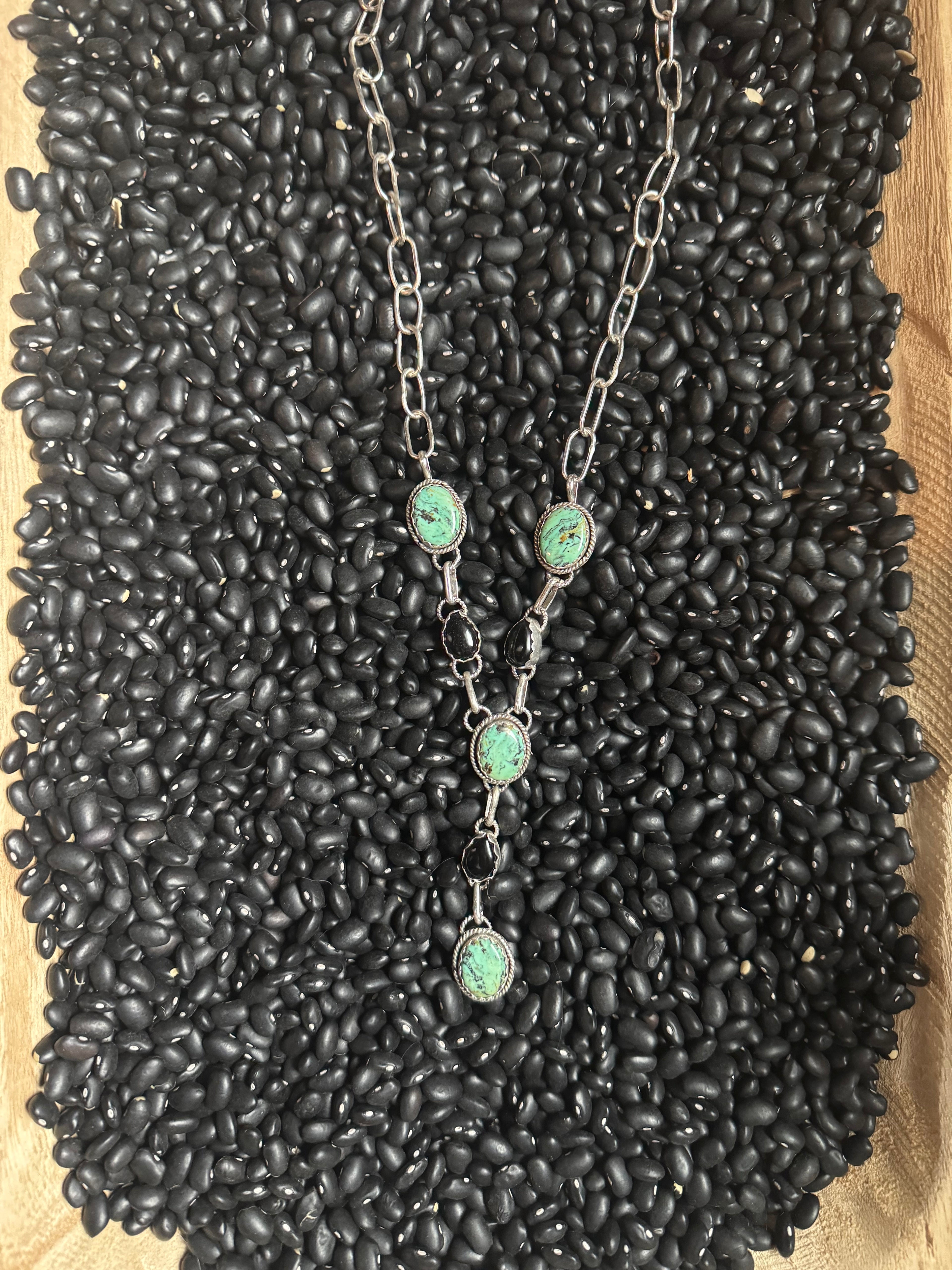 Mountain, turquoise and black Onyx lariat