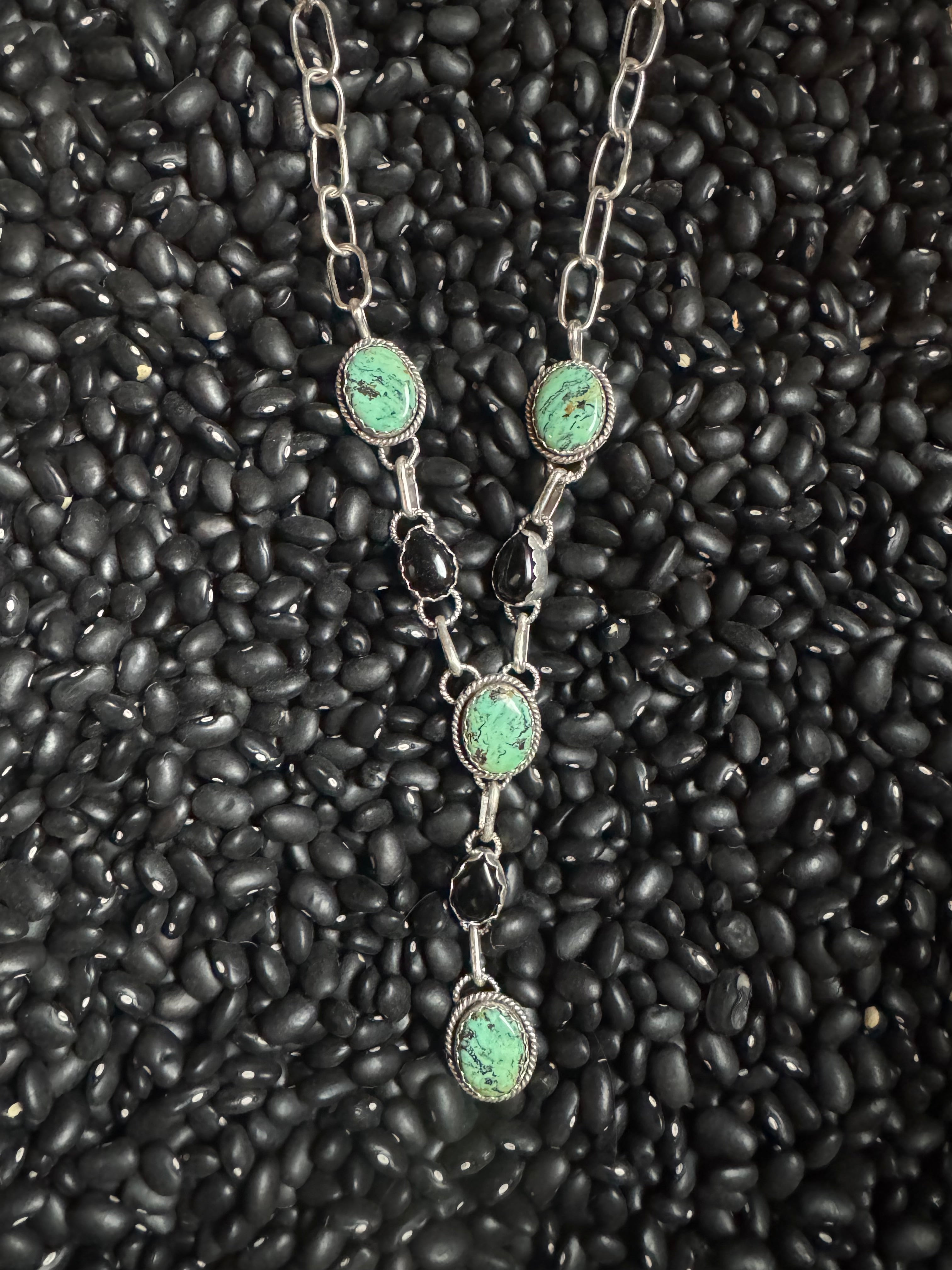 Mountain, turquoise and black Onyx lariat