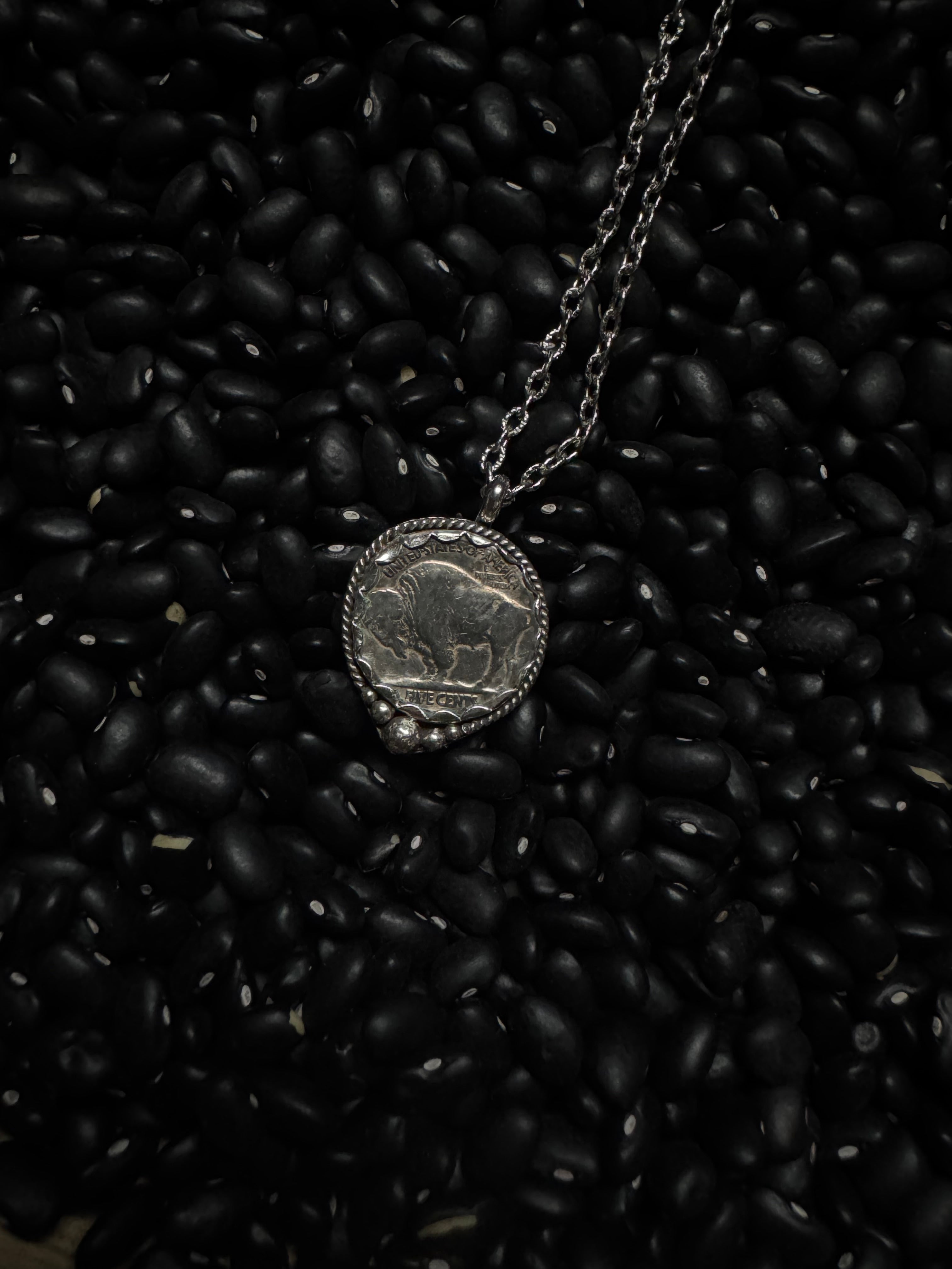 Buffalo pendant tales