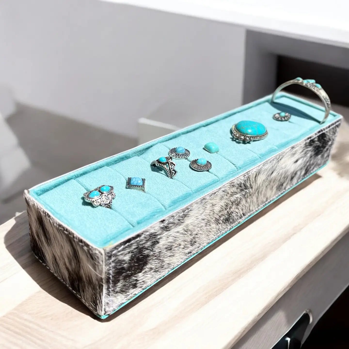 Turquoise all cowhide ring display