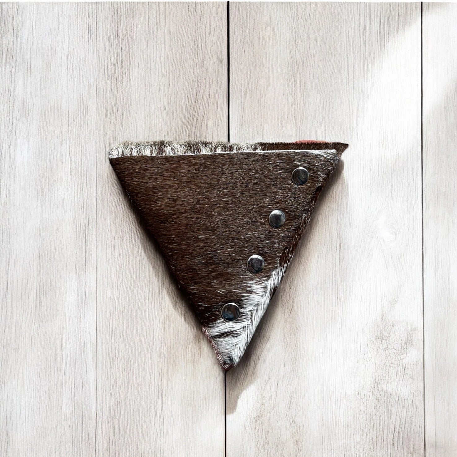 Brown cowhide triangle jewelry pouch