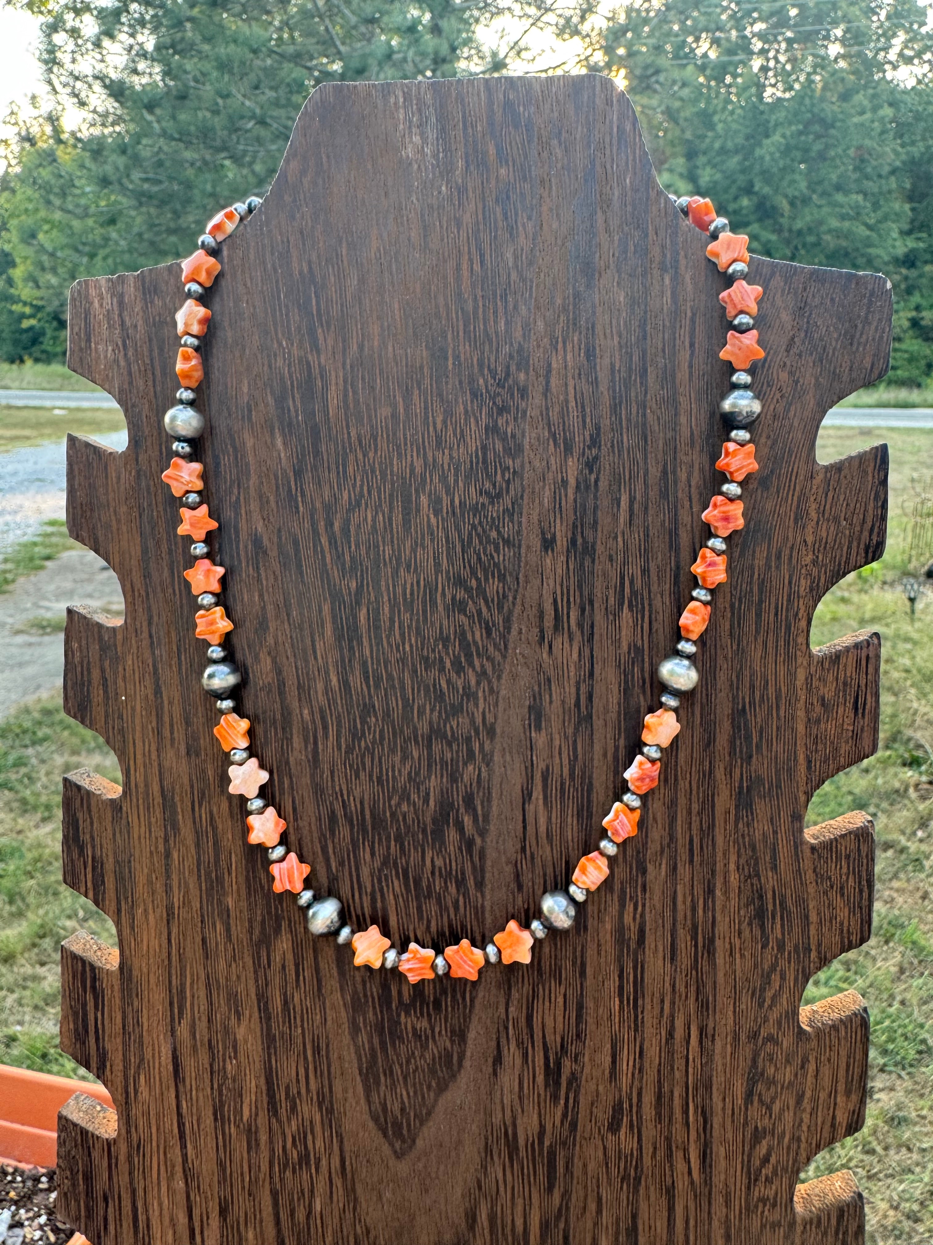 Orange spiny oyster star necklace 18 inches