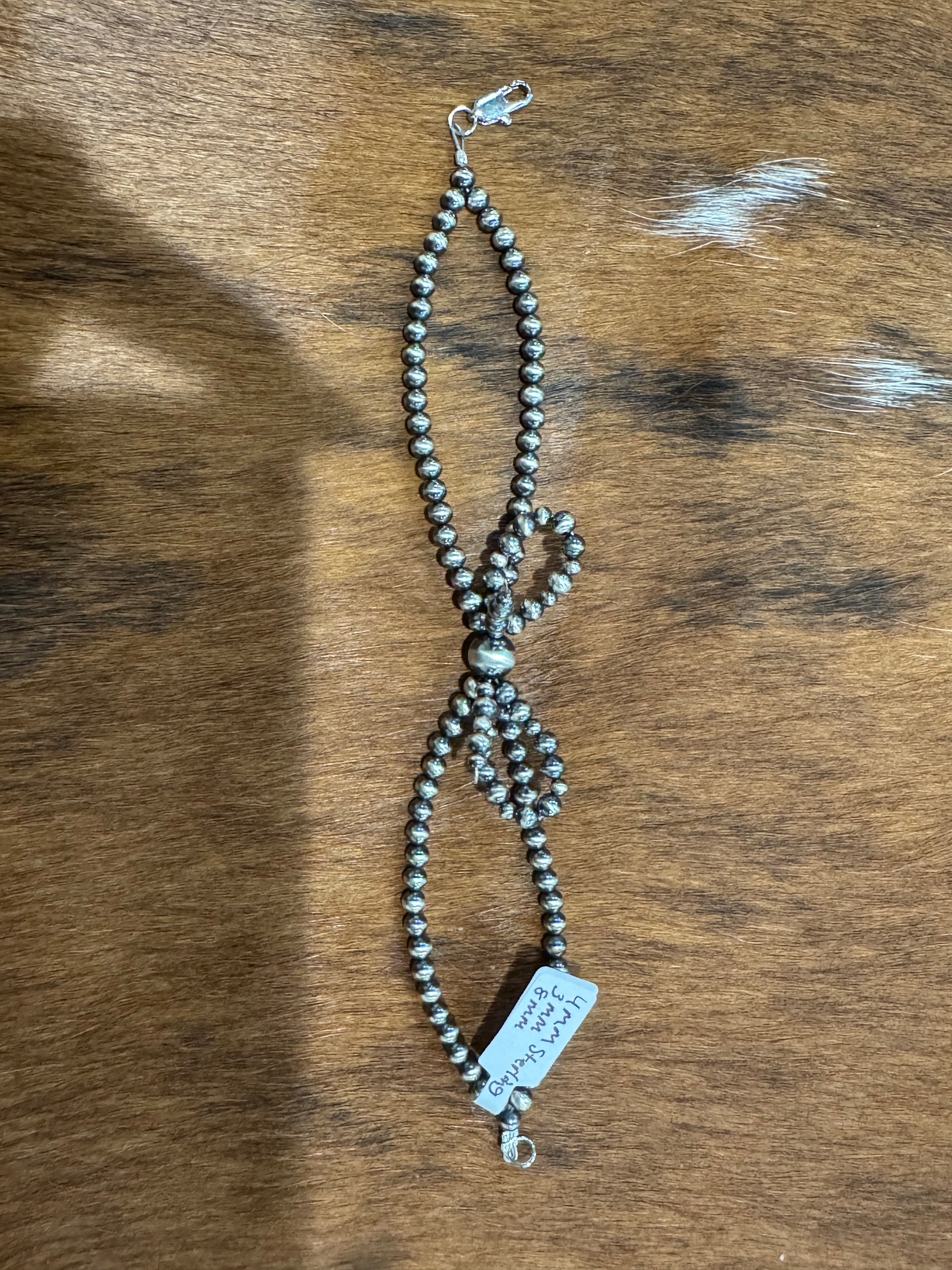 Sterling silver bow bracelet