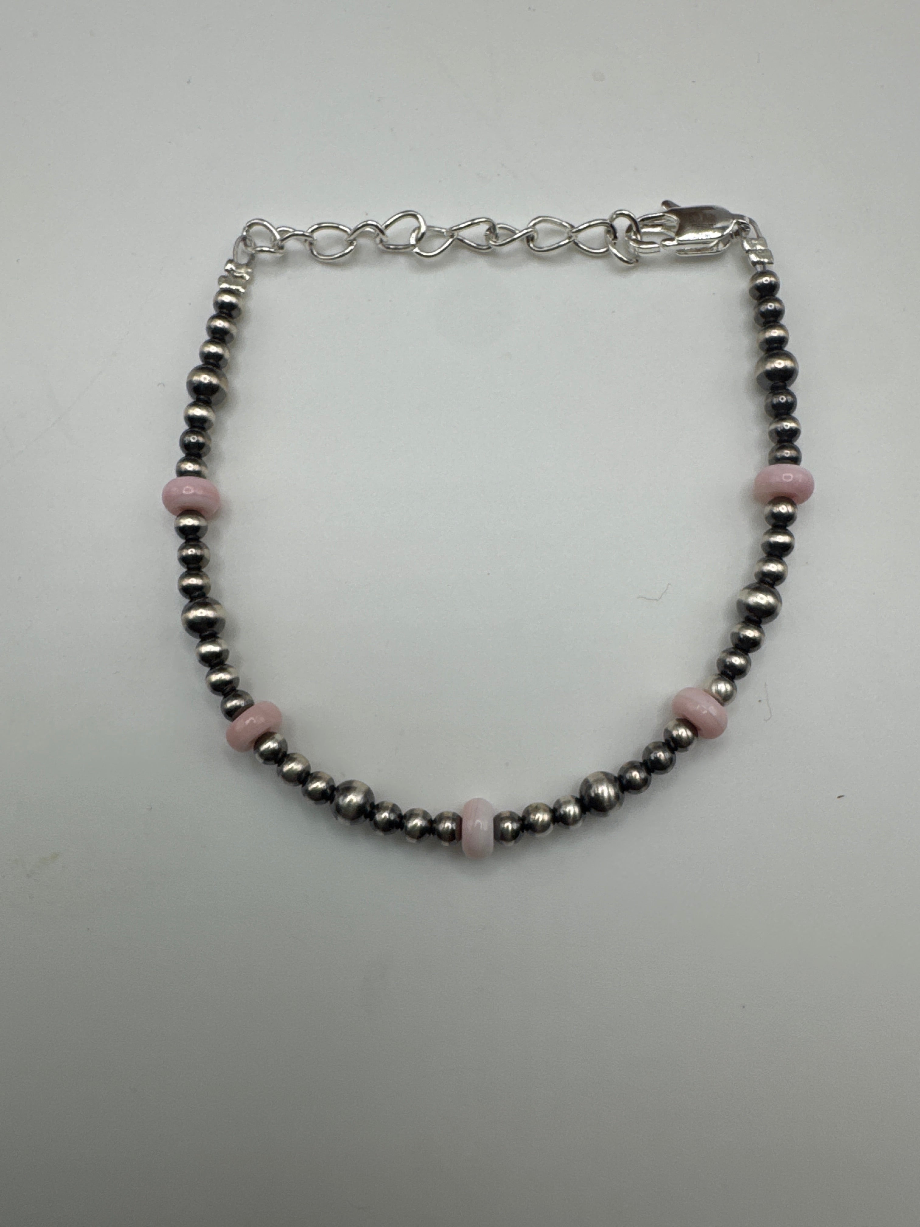 3 and 4mm pink conch, sterling silver bracelet